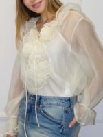 Прозрачная блузка с воланами