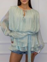 Pikendatud drapeeringuga pluus