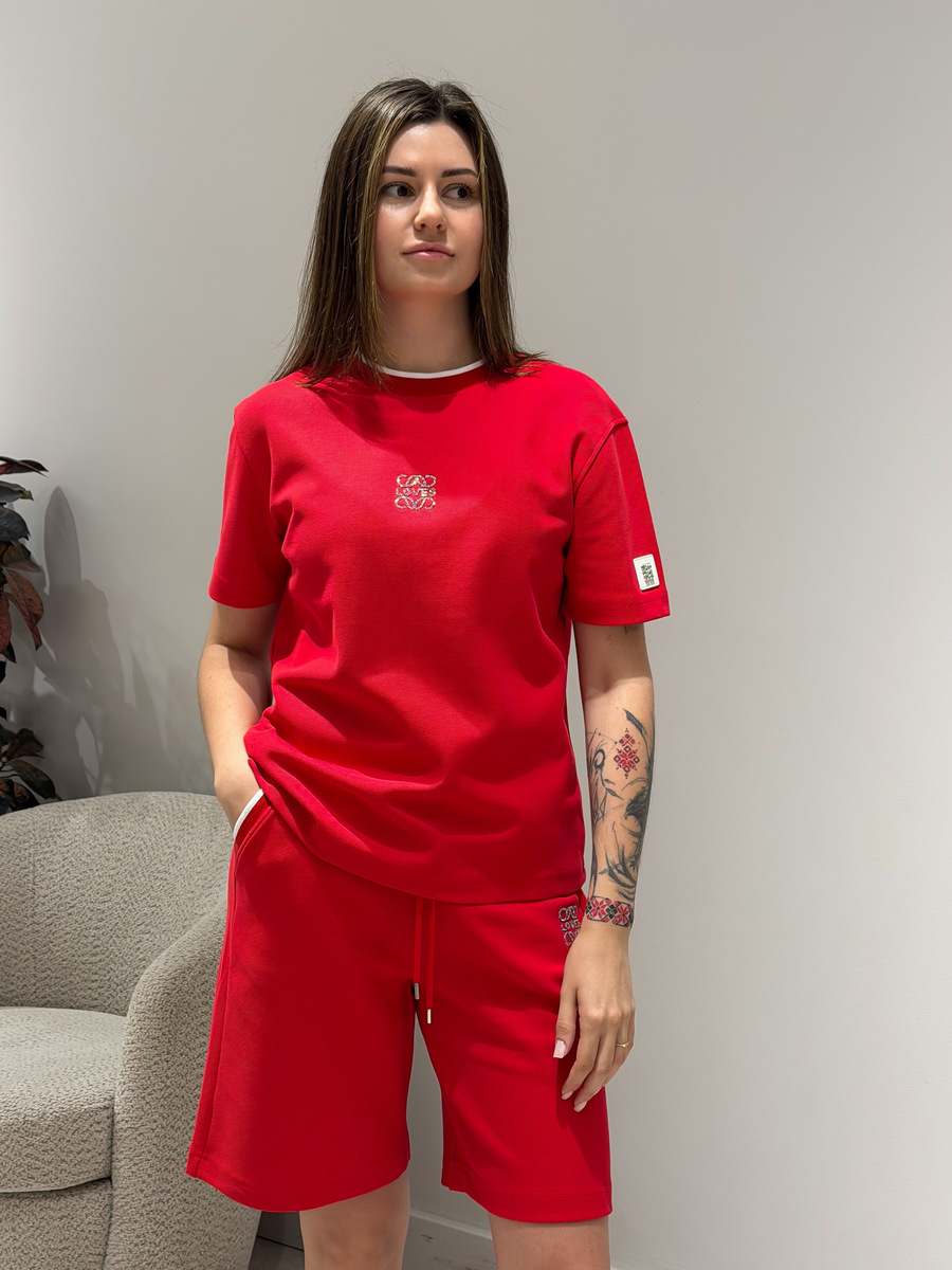Lühikeste pükstega spordidress Lühikeste pükstega spordidress