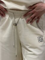 Paelaga lühikeste pükstega spordidress